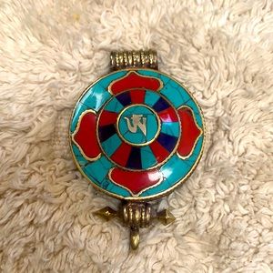 TIBETAN “SNEAKY” PENDANT
